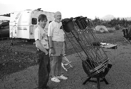 Richard Ozer with Bruce Sayer and the binocular telescope Bruce designed and built