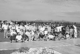 Group shot with volcanoes in the background